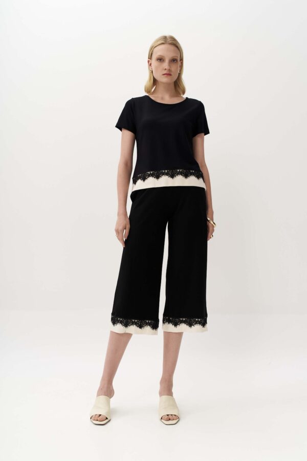 Ζιπ-κιλότ με contrast δαντέλα στο τελείωμα